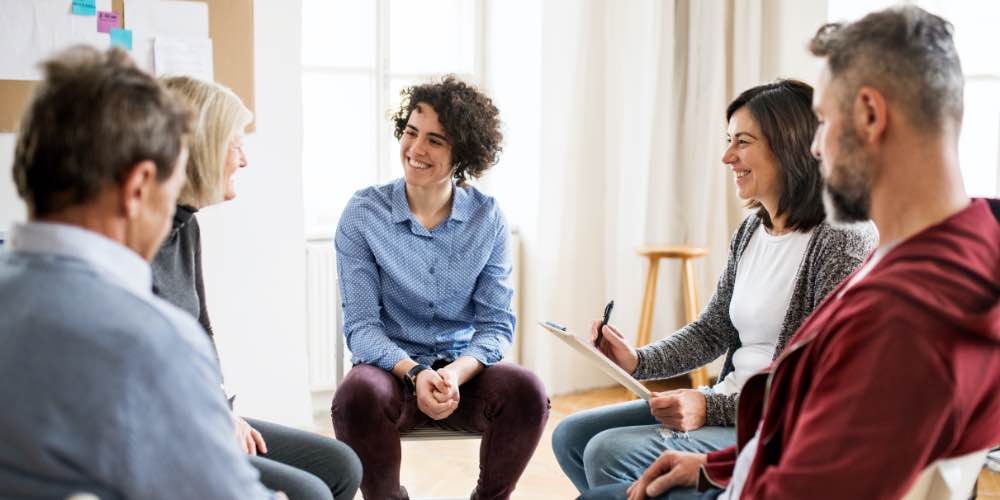 Group Of People In Therapy Together