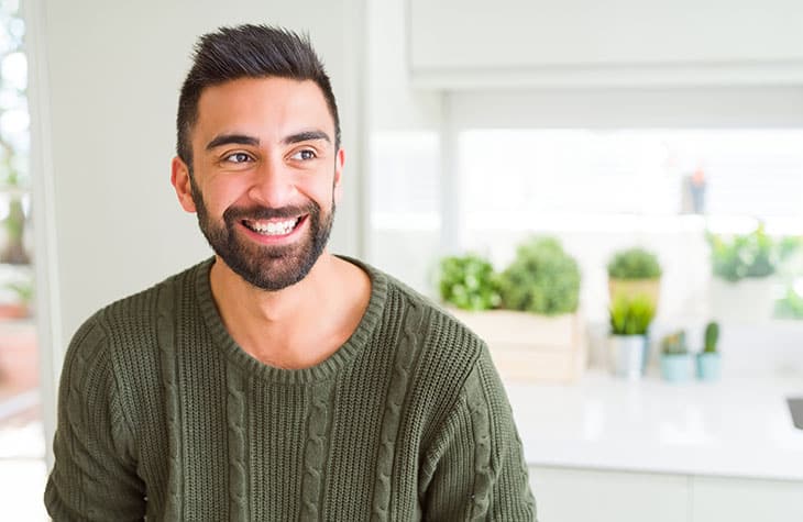 Man Smiling As He Is Better Able To Manage His Addiction Cravings With Exercise