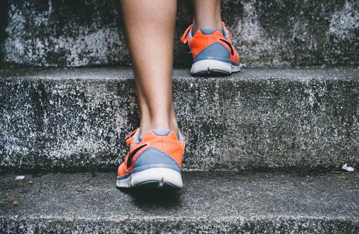 Person Walking Up Stone Steps For Mindfulness And Addiction Treatment In Motion