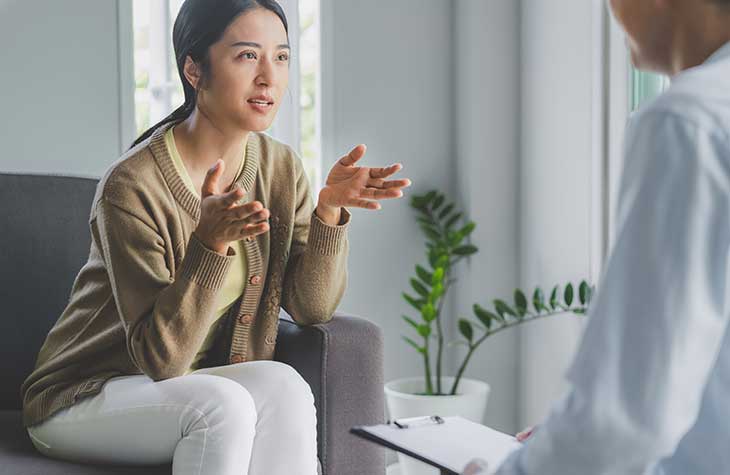 Woman In Therapy Discussing The Mental Health Benefits From Exercising