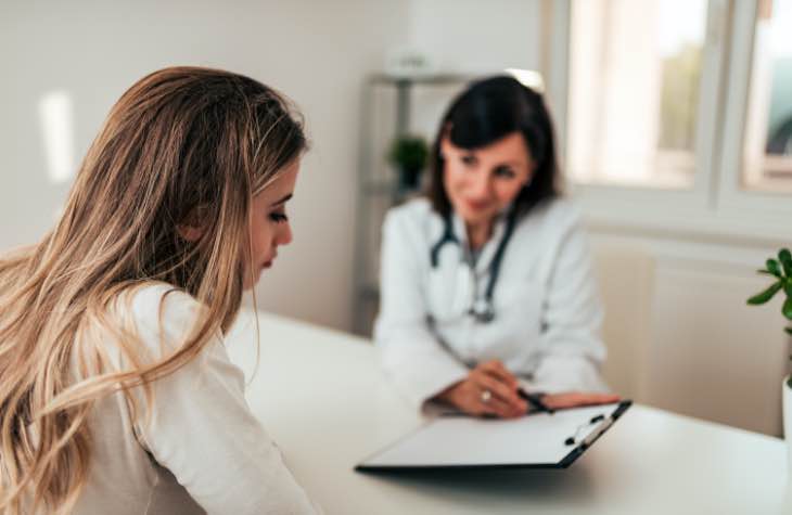 Doctor Meeting With Patient And Creating A Treatment Plan To Tackle Alcohol Abuse