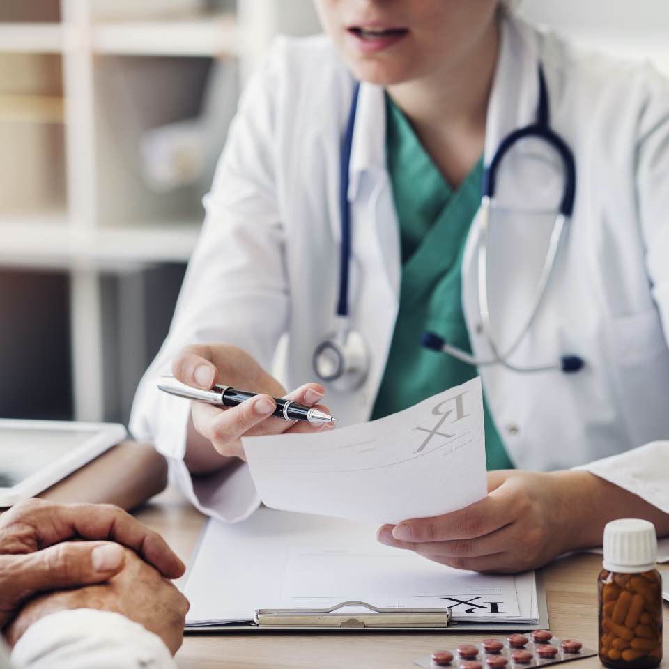 Doctor With Patient At Medically Supervised Inpatient Alcohol Detox