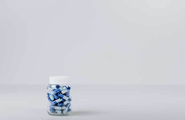 a pill bottle depicting the medication assisted treatment available at the hope house
