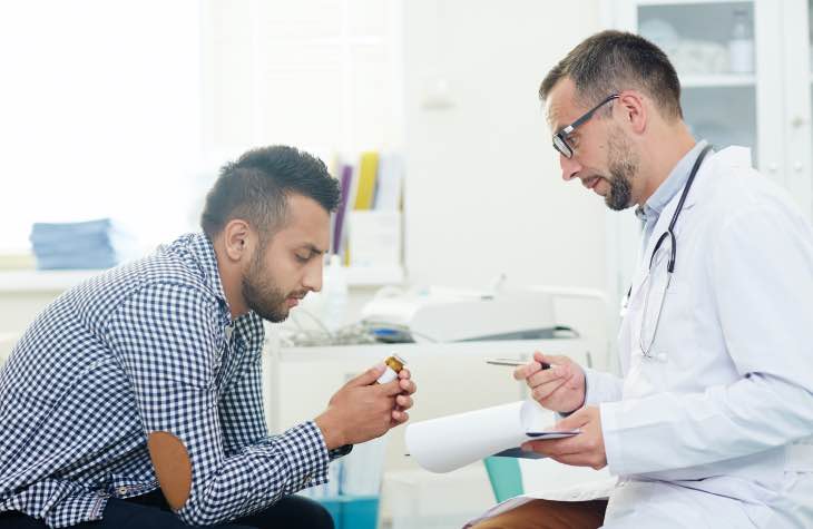 A Doctor Explaining Medication Assisted Treatment To A Client