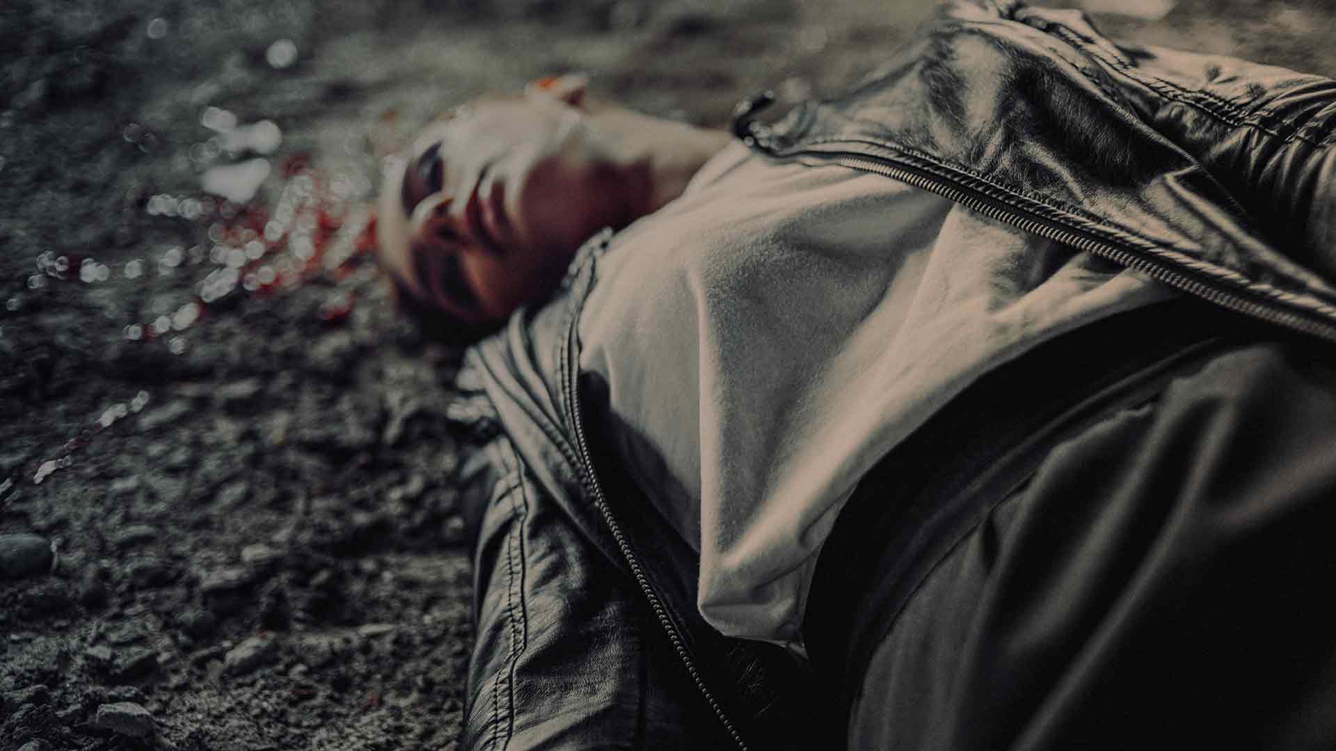 a woman on the floor who experienced an opioid overdose