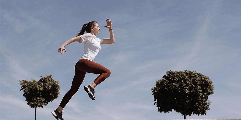a woman running can be associated with a higher metabolic rate
