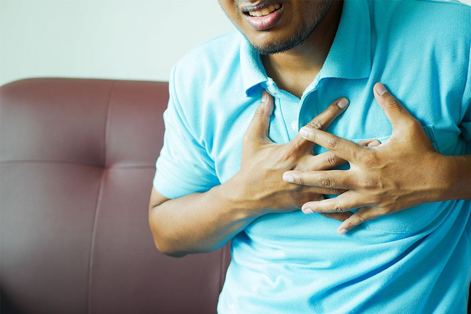photo of a person experiencing chest pain