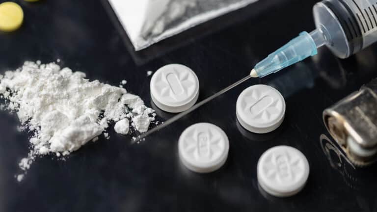 Assorted drugs and pills displayed on a table