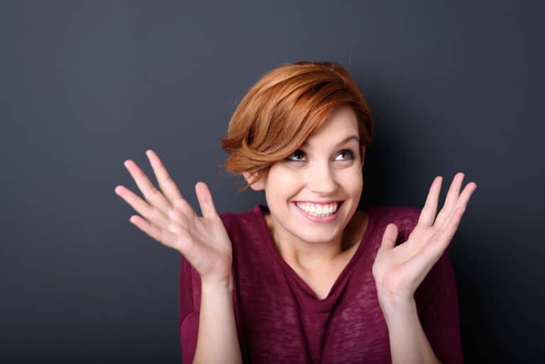 excited exuberant pretty young woman