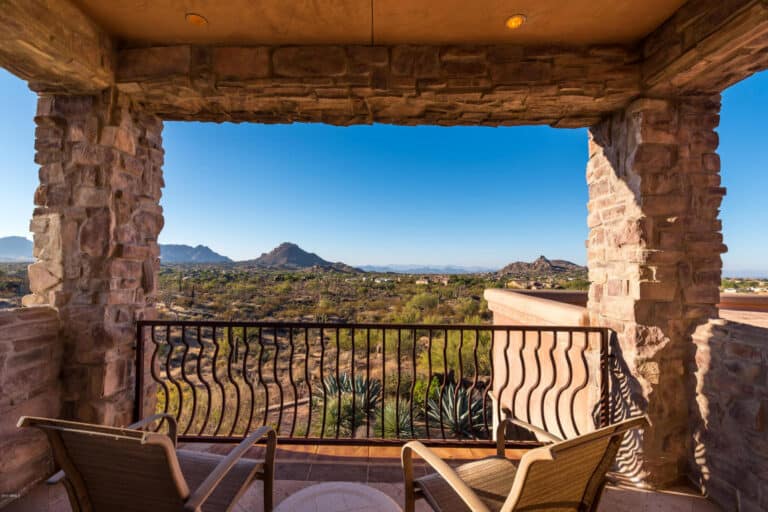 Patio view at The Hope House rehabilitation center overlooking desert landscape and mountains.