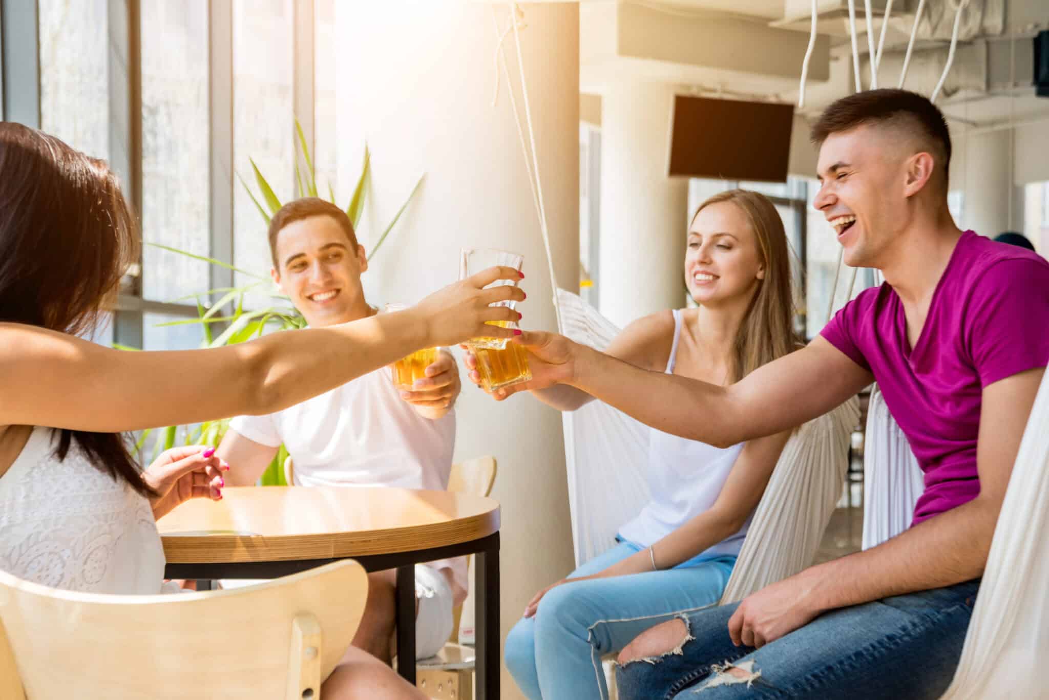 cheerful friends pub drinking beer