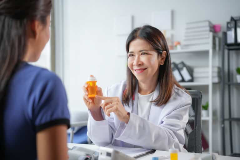 friendly female doctor explaining prescription med 2025 03 07 14 59 51 utc