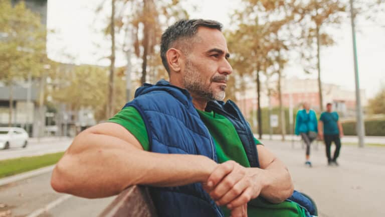 mature man while sitting on park bench bottom vi 2024 10 23 08 30 49 utc