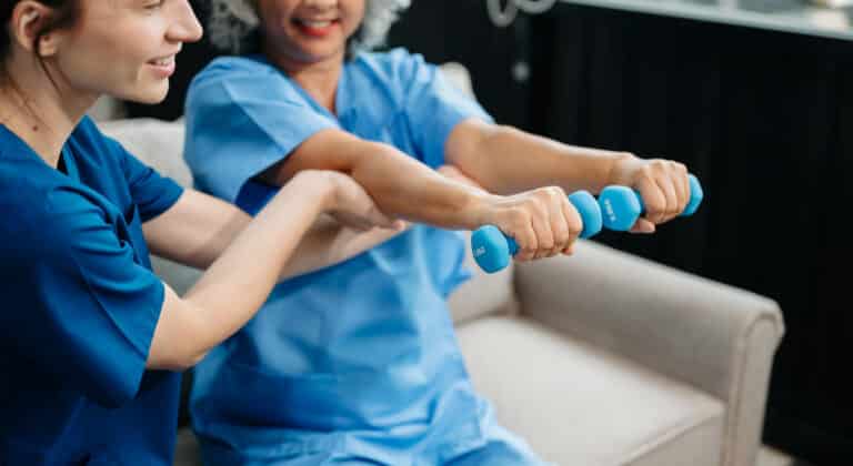 physiotherapist helping elderly woman patient stre 2025 06 09 17 31 48 utc