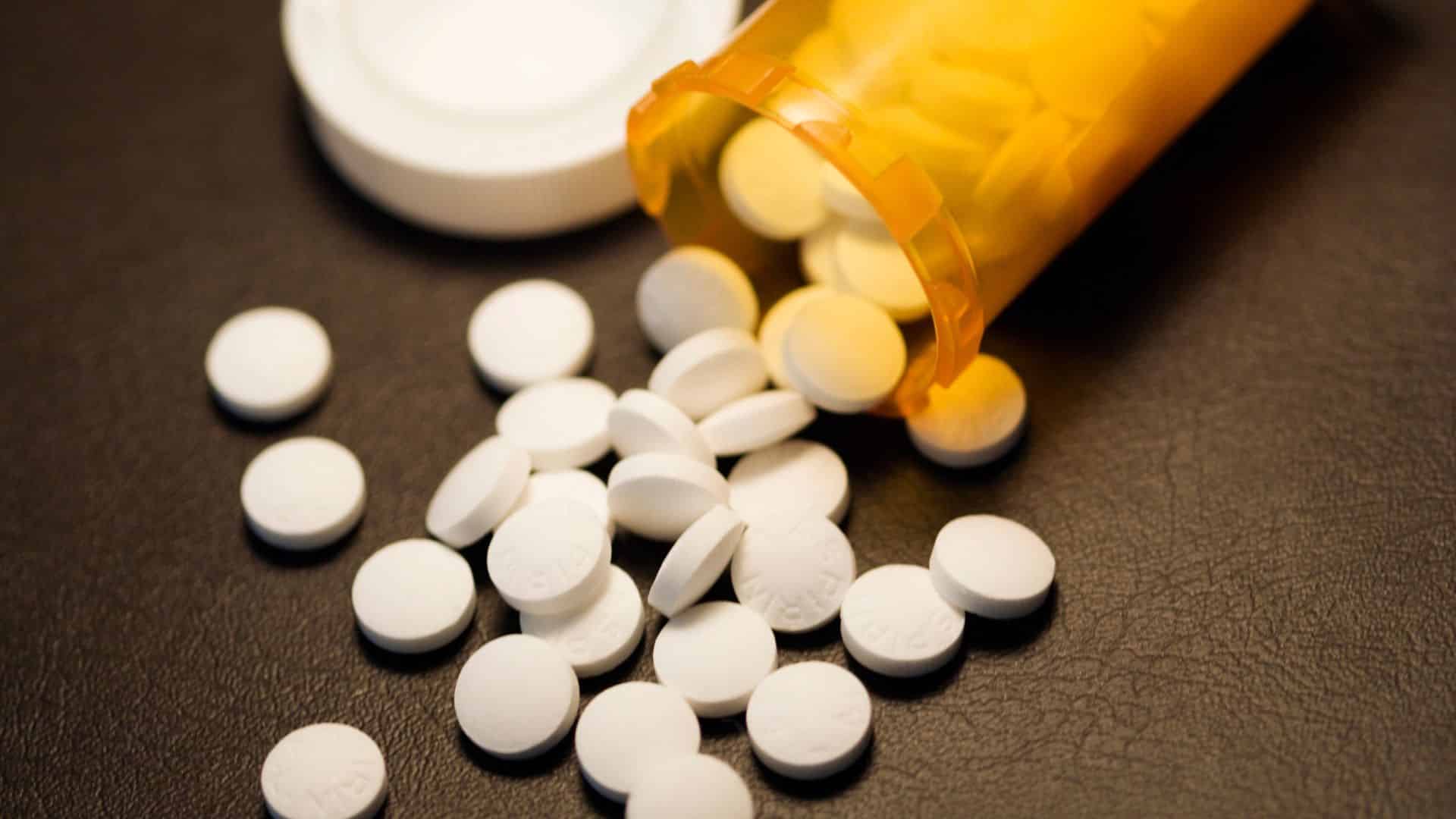 White pills and bottle